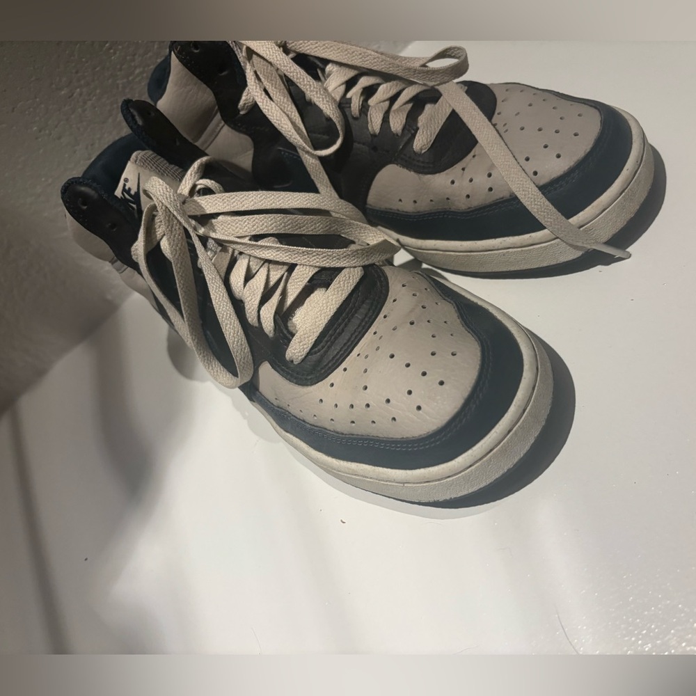 Dark navy and gray Nikes